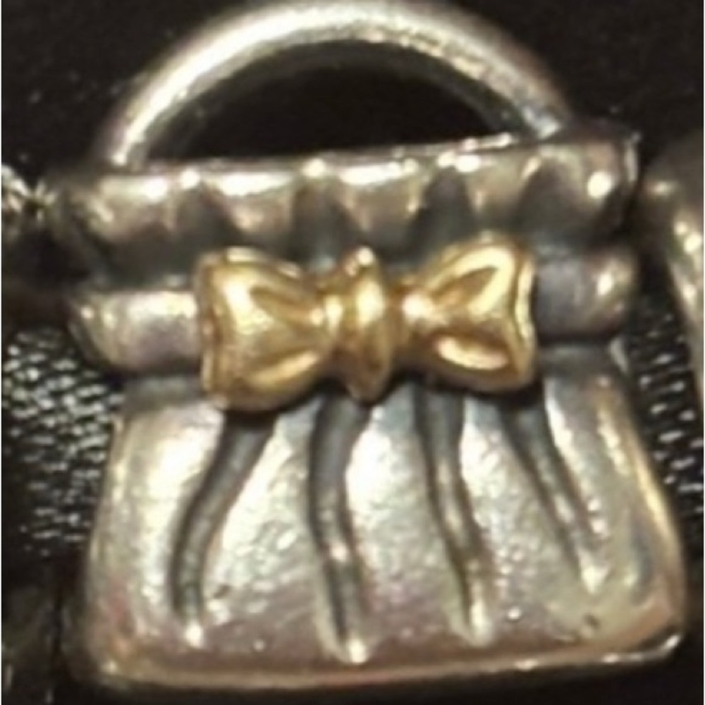 Authentic Pandora retired sterling silver purse charm with 14k gold bow